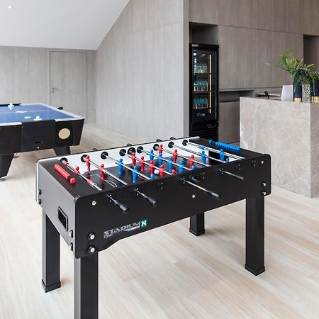 Grande Centre Point Pattaya Hotel Exterior photo Modern table football table